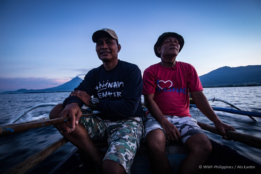 fishermen edgardo de vera left and joel bongkingki right set out to sea for an overnight fishing trip
