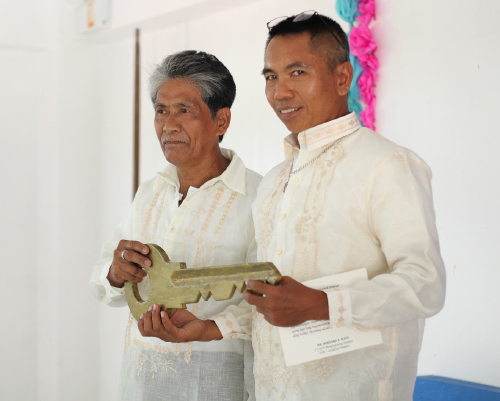 newly elected regional fisherfolk director of mimaropa for the month of may receives a ceremonial key from the previous director as he is sworn into office featured image