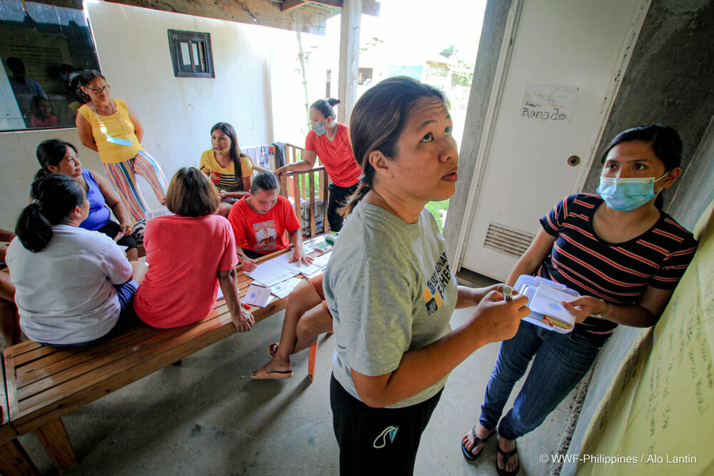 wwf philippines staff look over the by laws agreed upon by a gslc in paluan mindoro
